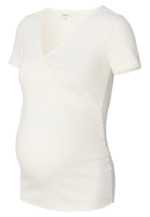 Haut de maternité à manches courtes en tissu côtelé crème, présentant un décolleté en V croisé et un ruching sur les côtés pour une silhouette ajustée.