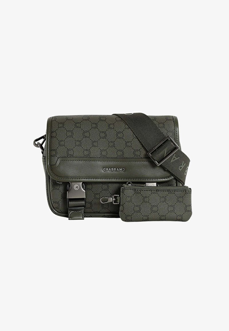 Sac bandoulière vert foncé avec un motif texturé, fermeture à rabat, quincaillerie en argent et pochette zippée amovible. Sangle ajustable incluse.