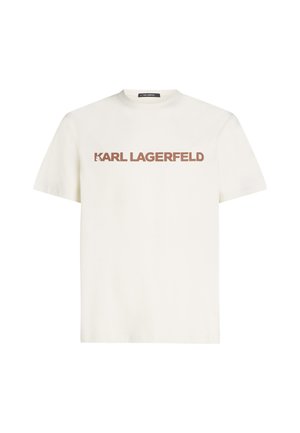 White cotton t-shirt with short sleeves, featuring bold brown text reading "KARL LAGERFELD" across the front. Round neckline, regular fit.