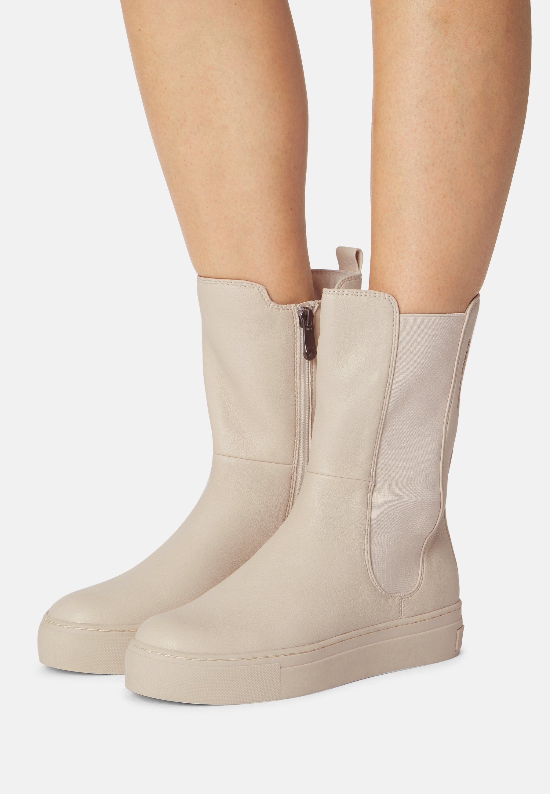 white plateau boots