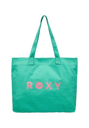 Zielona torba na ramię z różowym napisem i logo "ROXY", wyposażona w dwa uchwyty do przenoszenia.