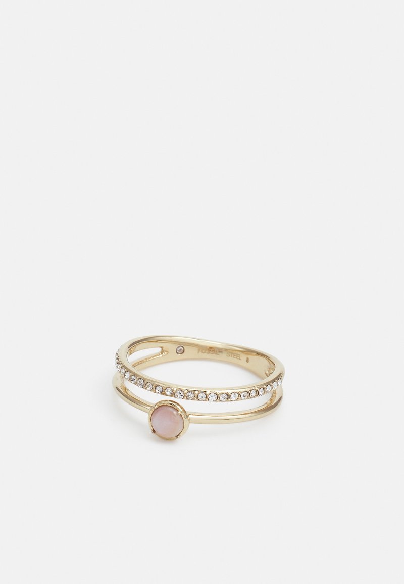 Bague double anneau en or avec de petites pierres claires sur un anneau et une pierre ronde rose pâle sur l'autre anneau, présentée sur fond blanc.
