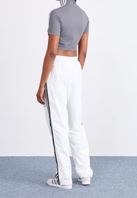 adidas Originals Tracksuit bottoms - white