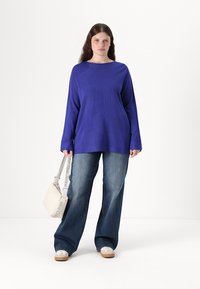 ONLY Carmakoma CARWILLY - Wide Leg - special blue grey denim