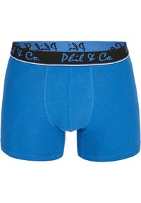 Modré bavlněné trenýrky s černým pasem, na kterém je modrý logový text. Hladká textura s přiléhavým střihem a kontrastními švy.