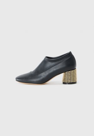 CLEO - Tronchetti - nero
