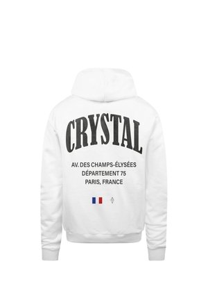 Felpa bianca con cappuccio caratterizzata da un grande testo nero che recita "CRYSTAL" e dettagli sugli Champs-Élysées, Parigi. Include un piccolo grafichetto della bandiera francese.