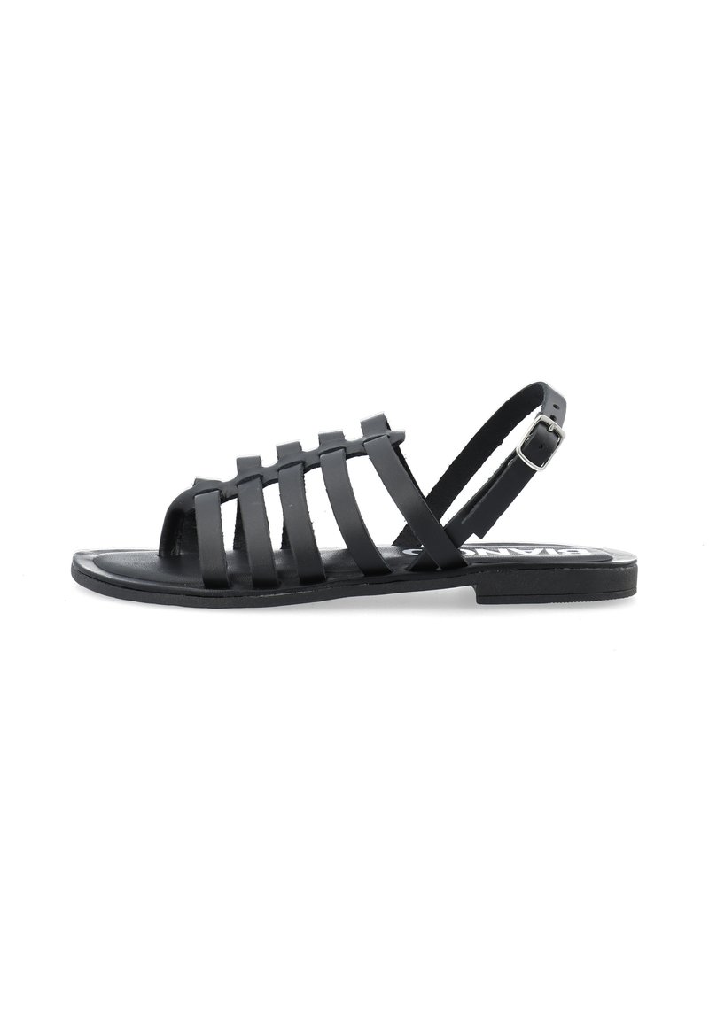 Svarta sandaler har en öppen tådesign med flera platta remmar och en justerbar ankelrem. Tillverkade av slätt syntetiskt material.