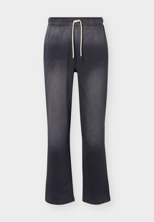Nike Performance, Tracksuit bottoms - black/pale ivory