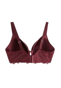 Burgundy-bh med spetsöverdrag, justerbara axelband och hakstängning. Slät innerfoder med blommig spetsdetalj längs kanterna.