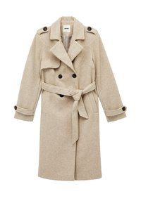 Beige wollen jas met dubbelknoopsluiting, ceintuur in de taille, grote revers en verstelbare met knopen sluitende mouwen. Voorzien van zijzakken en een zachte textuur.