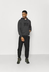 Helly Hansen HH LOGO - Mikina s kapucí - ebony melange