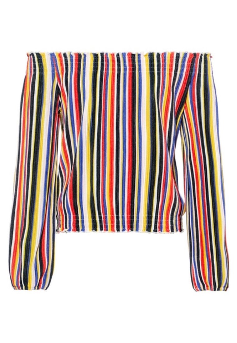 Pitkä hihaton paita, jossa on moniväriset pystysuorat raidat punaisena, sinisenä, keltaisena, mustana ja valkoisena. Elastinen kaula-aukko ja helma.