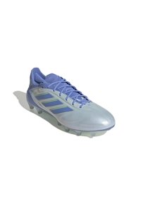 Light blue soccer cleat with a smooth finish, featuring a textured tongue, three green stripes, and multiple studs for traction.
