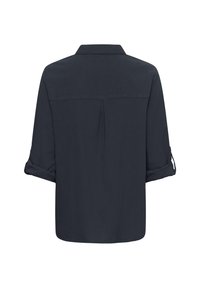 Donkerblauw shirt met een kraag, opgerolde mouwen en een centrale rugplooi voor extra structuur en pasvorm. Gladde textuur.