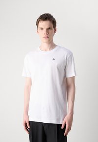 Calvin Klein Jeans REGULAR FIT TEE WITH BOLD BACK PRINT - T-shirt con stampa - bright white