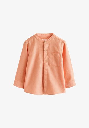 Dlhý rukáv broskyňovej farby tričko pre batoľatá s mandarínskym golierom, tromi drevenými gombíkmi vpredu a vreckom na ľavej strane hrudníka.