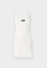 Robe blanche sans manches ajustée avec fines bretelles et petit motif soleil noir au centre devant.