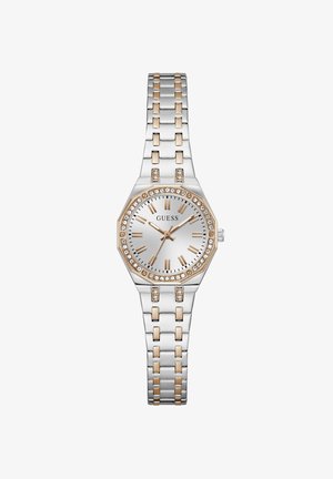 Dámské hodinky ve stříbrné a zlaté barvě s pouzdrem zdobeným krystaly, římskými číslicemi a kovovým náramkem s odkazem, zobrazující čas 10:09:35.