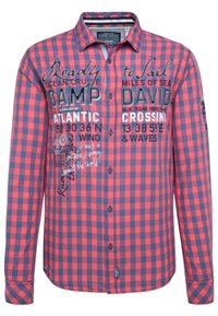 Chemise à manches longues à carreaux rouges et marine, avec boutons, graphiques brodés et texte imprimé. Confectionnée en tissu léger.