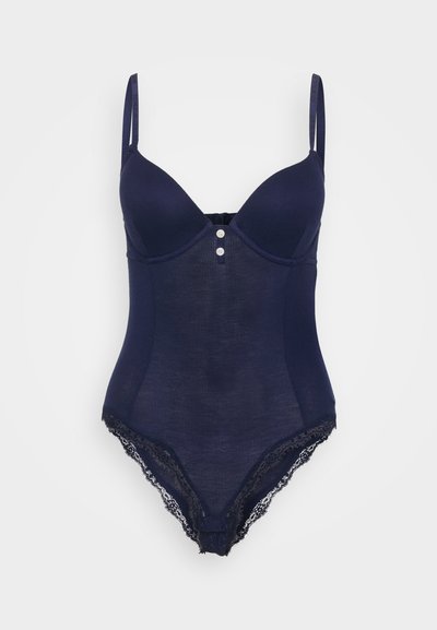 Bodysuit azul marinho com textura em relevo, copas almofadadas, alças ajustáveis e acabamento em renda na parte inferior, com botões decorativos na frente.