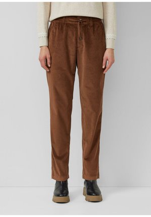 - Spodnie materiałowe