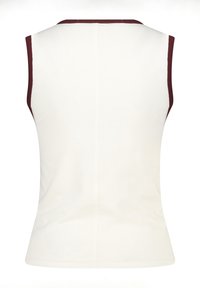Sleeveless top in cream with a maroon neckline and armholes. Fitted design with smooth texture and back seam detail.