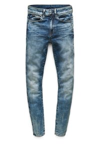 Skinny-fit jeans i blått denim med en blekt tvätt, subtila slitningar, fem fickor och metallknappstängning.