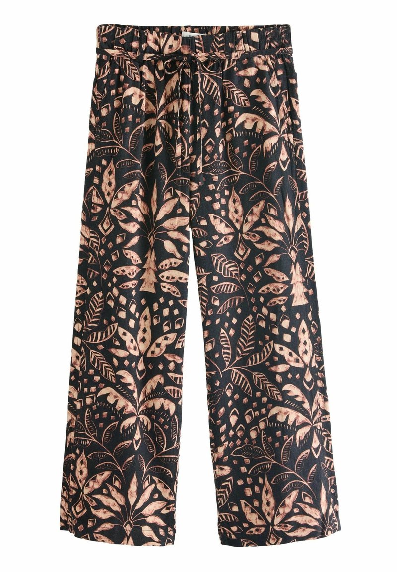 Pantalon noir à jambes larges avec motif beige de feuilles tropicales et géométriques, taille élastique et cordon de serrage à l'avant.