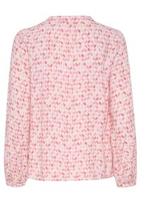 Långärmad blus i ljusrosa tyg med geometriskt bladmönster i olika nyanser av rosa, med en rynkad baksida och elastiska ärmslut.