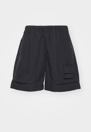 Black cargo shorts with an elastic waistband, featuring a side pocket and a loose fit. Made of lightweight fabric, with a smooth texture.
