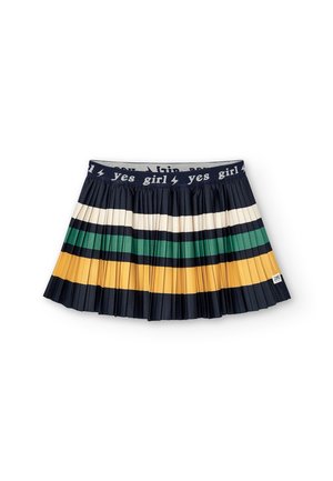 Jupe plissée à rayures horizontales bleu marine, crème, verte et jaune, avec une ceinture bleu marine portant le texte "yes girl" et des éclairs.