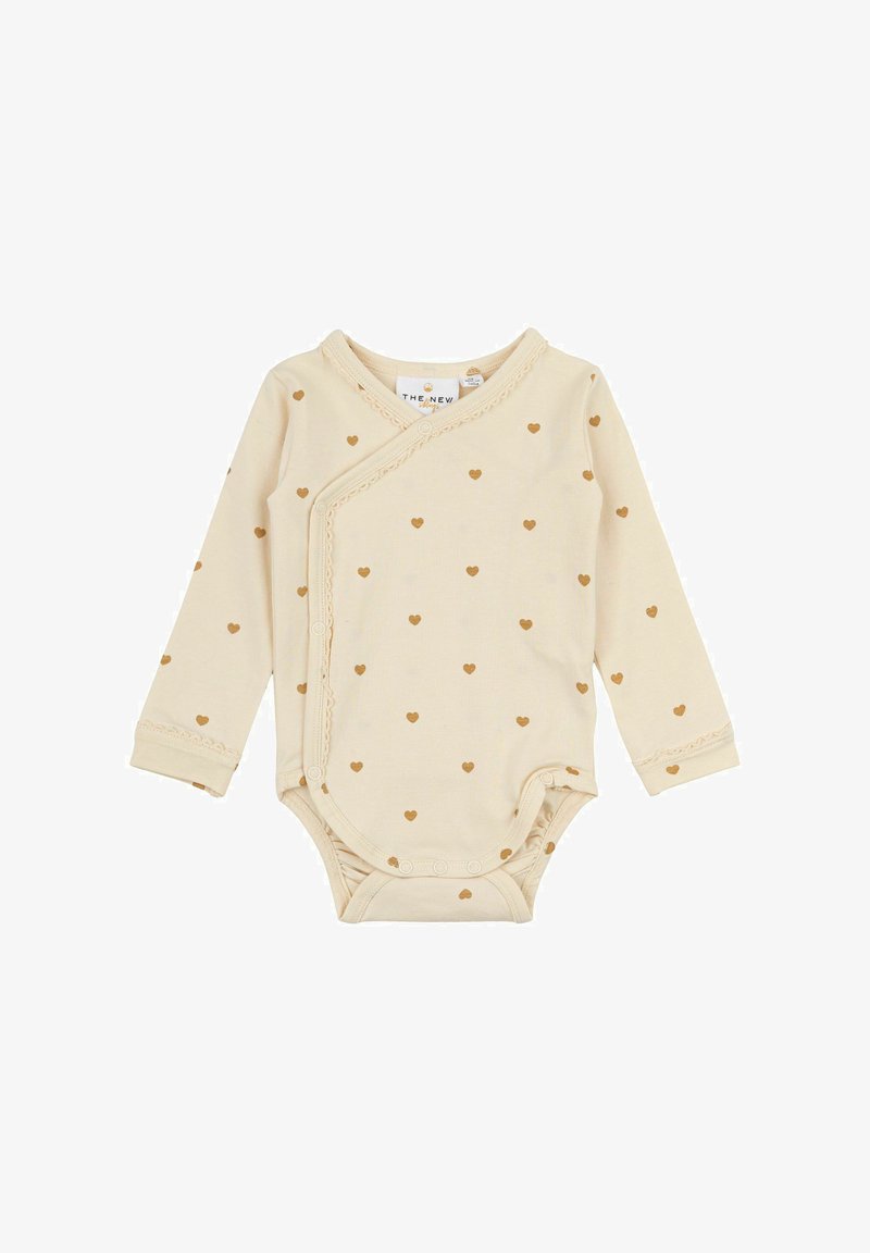 Bodysuit za dojenčke z dolgimi rokavi v svetlo bež barvi, okrašen s razpršenimi zlatimi srčkami in nežnim čipkastim robom okoli ovratnika in manšet.