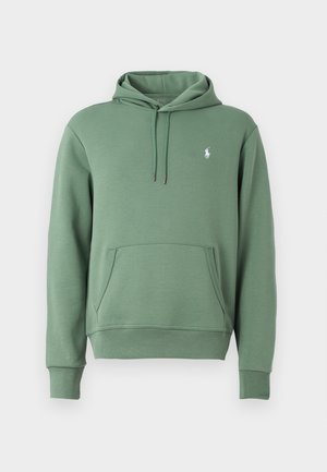 Green hoodie made of soft fabric, featuring a kangaroo pocket and drawstring hood. Subtle logo on the chest. Classic fit with ribbed cuffs.