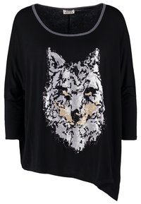 Svart löst sittande topp med vid halsringning och trekvartslånga ärmar, med ett broderat design av en varghuvud i silver och guldpaljetter på framsidan.