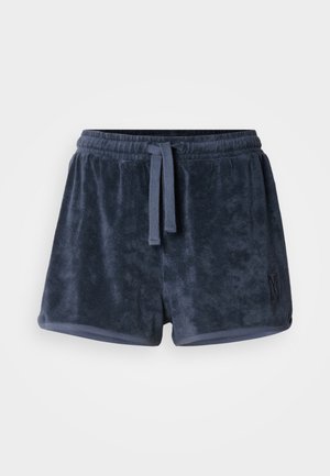 Shorts en tissu éponge bleu marine avec une taille élastique, un cordon de serrage réglable et un petit logo brodé sur le côté. Texture douce.