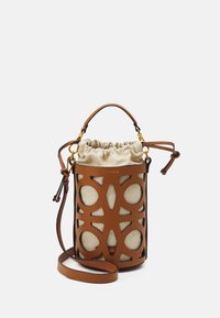 Brown leather bucket bag with cut-out design, beige fabric lining, drawstring closure, and adjustable shoulder strap. Gold-tone hardware accents.