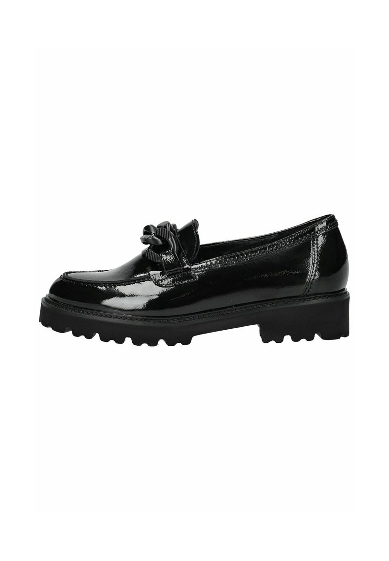 Mocasines de piel sintética negra con punta redonda, detalle de lazo decorativo, y suela de goma gruesa con tacos texturizados para mayor tracción.