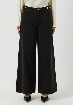 YASLAMI - Wide leg - dark brown denim
