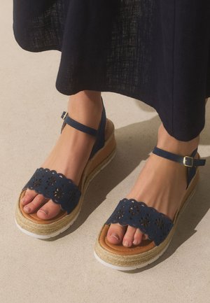 Next, - Espadryle
