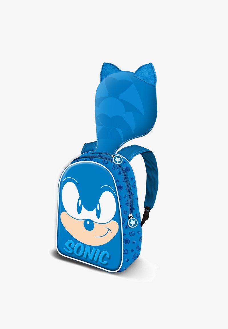 Sac à dos bleu présentant le visage de Sonic le hérisson, avec des oreilles en peluche sur le dessus, une texture lisse, une fermeture éclair et un petit tirette en forme d'étoile.