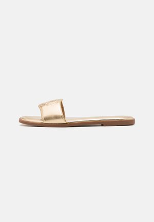 Mules - gold metallic