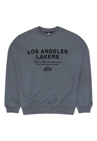 Šedá mikina s černou nášivkou "LOS ANGELES LAKERS". Hladký materiál s žebrovanými manžetami a spodním lemem. Obsahuje detail loga týmu.