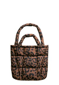 Brown quilted tote bag with black leopard print. Features two padded handles and a structured shape, emphasizing textured, padded material.