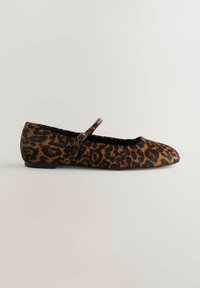 Leopard print flat shoe with a rounded toe, black accents, and a side buckle strap. Soft fur-like texture and a low-profile black sole.