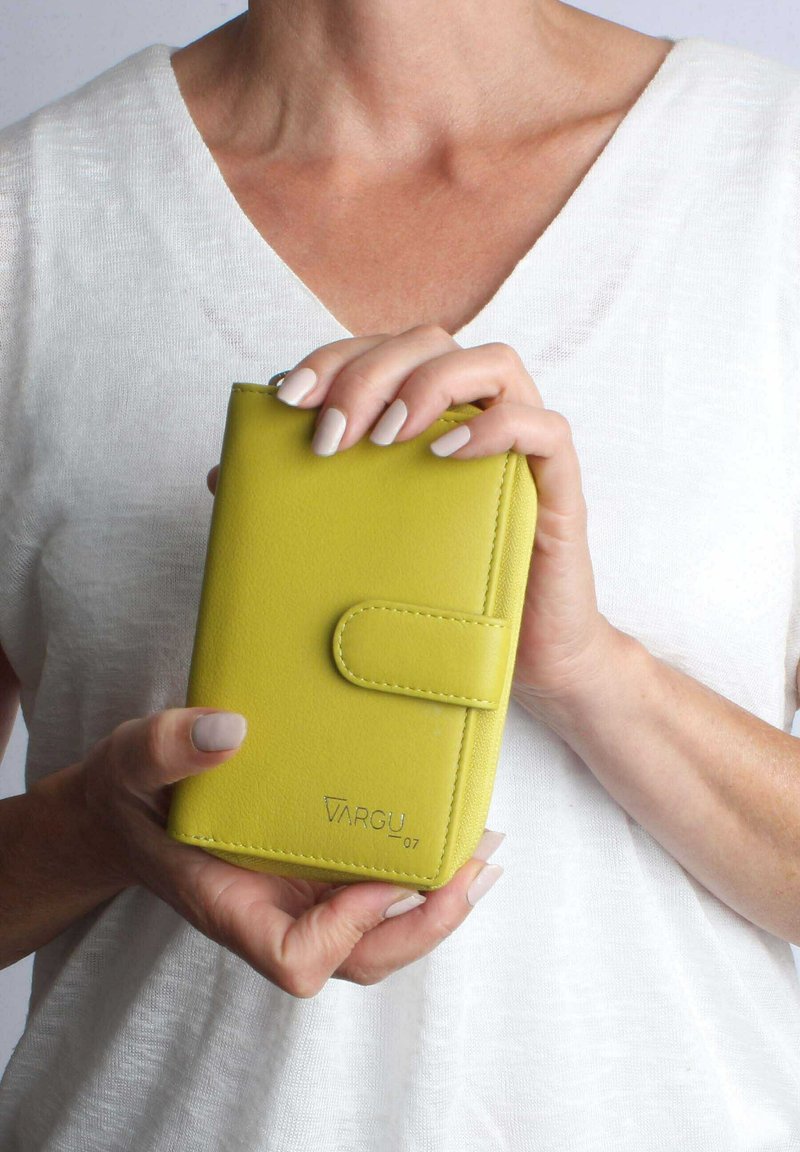 Yellow leather wallet with a smooth texture and a snap closure, featuring embossed logo and contrasting stitching. Compact and rectangular shape.