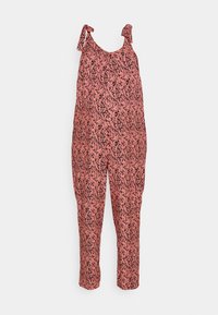 Macacão rosa com padrão, de corte solto, com laços nos ombros e pernas curtas. Apresenta um design abstrato em tons mais escuros por toda a peça.