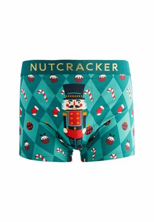 Grønne boxershorts med et nisseknækker-design, slikstokke og ornamenter på et diamantmønster, med en gylden "NUTCRACKER" linning.