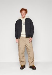 Carhartt WIP JET PANT - Hlačami s stranskimi žepi - khaki