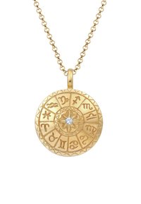 Gul cirkulært vedhæng med stjernetegnssymboler, en central diamantdetalje og en tekstureret overflade med en kæden halskæde.